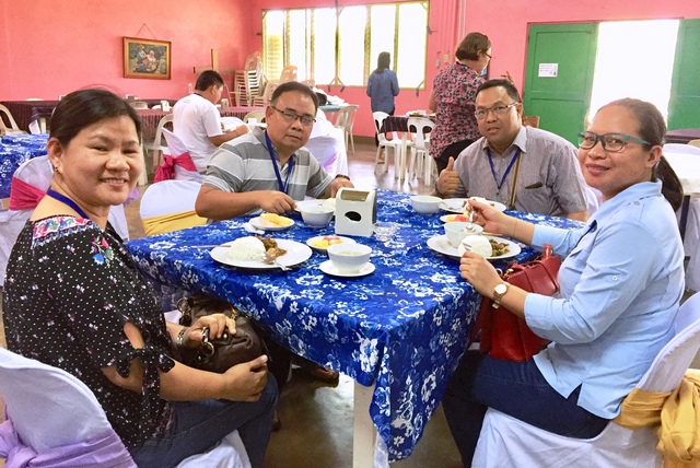 Couples enjoys their sumptuous and nutritious meal prepared by Campsite Kitchen Team